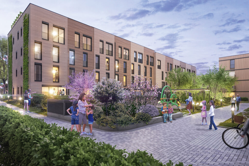 Neubauprojekt Metzgergrün in Freiburg-Stühlinger mit Holzfassade, begrüntem Innenhof und spielenden Kindern